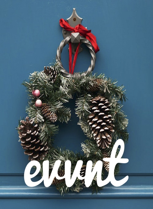 evvnt logo with Christmas Wreath behind it